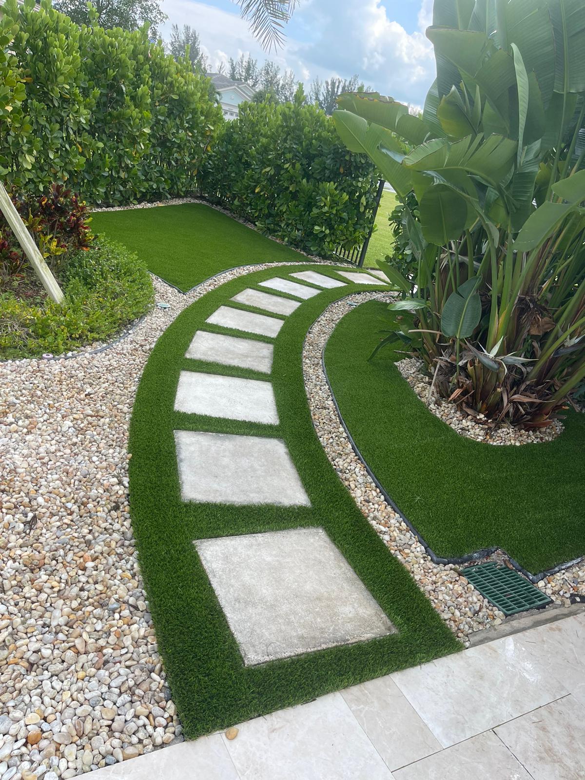 Curved paver walkway with turf borders